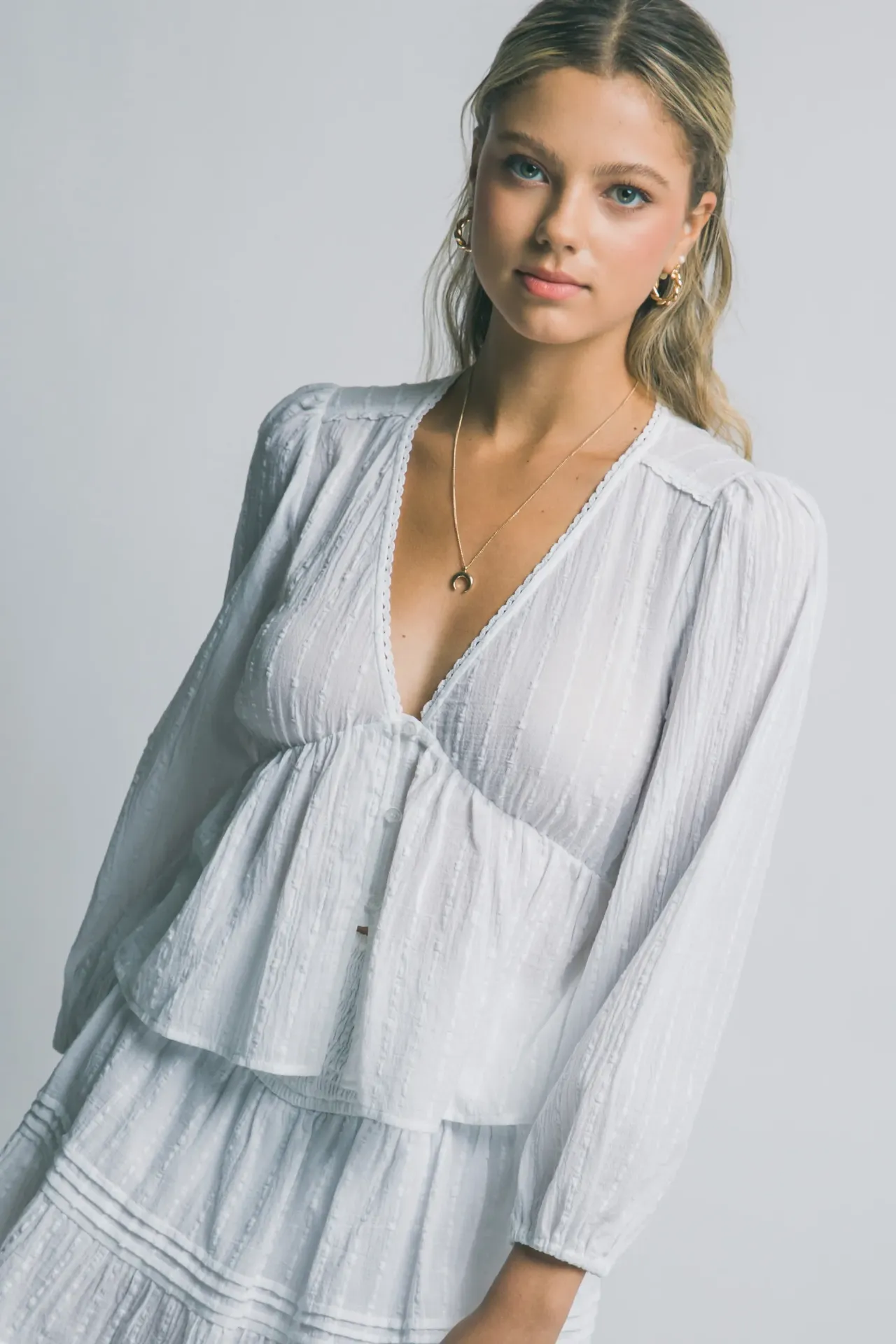 10406TN Blusa de Rayas con Vuelo en la Cadera